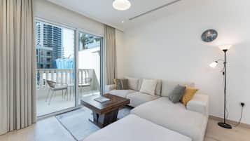 Exclusive Apartment, 1 King Bed, Air conditioning, Pool View | Living area