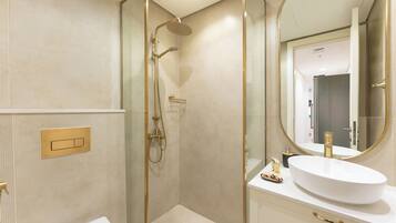 Exclusive Apartment, 1 King Bed, Air conditioning, Pool View | Bathroom | Shower, hair dryer, slippers, towels