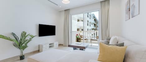 Exclusive Apartment, 1 King Bed, Air conditioning, Pool View | Living room | 40-inch Smart TV with digital channels