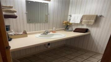 Shower, towels, soap, shampoo