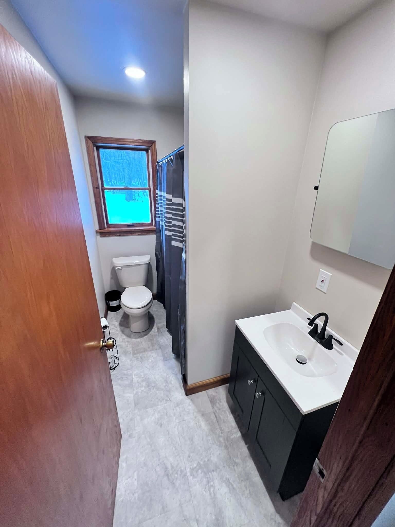 Jetted tub, hair dryer, towels, toilet paper