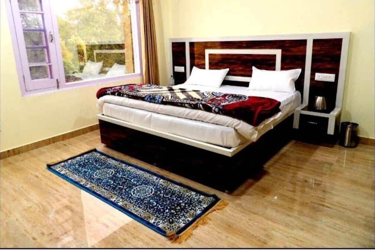 Familjestuga - 4 sovrum - privat badrum - utsikt mot trädgården