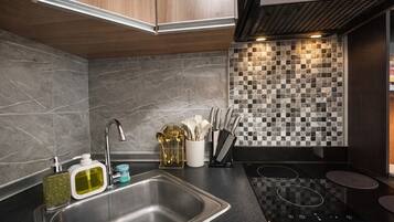 Fridge, microwave, stovetop, cookware/dishes/utensils