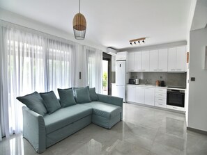 Apartment, 3 Bedrooms, Terrace | Living room - Renata Apartment in Nikiti (Sithonia)