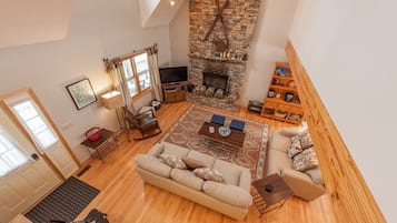 Smart TV, fireplace, DVD player, books