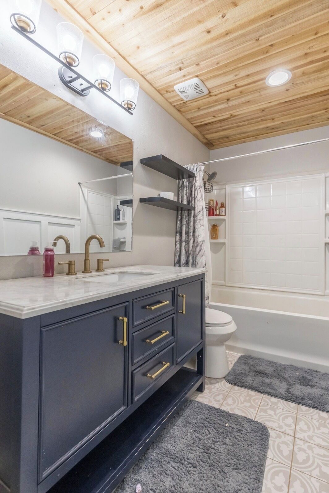 Shower, towels, soap, toilet paper