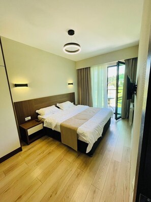 1 slaapkamer, een strijkplank/strijkijzer, wifi, beddengoed