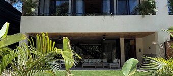 Open the back gate, walk 5’ down a jungle trail and arrive to Playa Hermosa