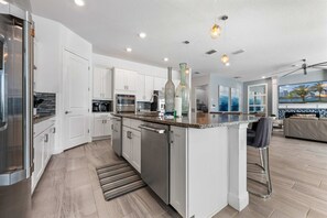 Fridge, microwave, oven, stovetop - Happiest Home on Earth - Custom Pirate & Nature Bunks, 8 King Suites, Theater & Pool (Kissimmee)