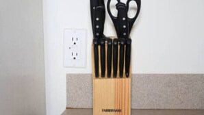 A knife block with knives on a countertop. - Stylish 1BR Apartment Prime Location (Belleville)