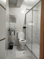 Shower, towels, soap, toilet paper