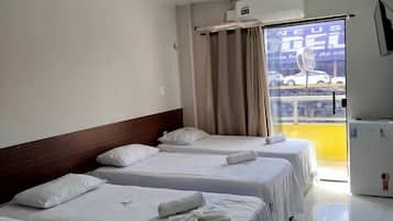 Standard Quadruple Room, City View | Desk, laptop workspace, free WiFi