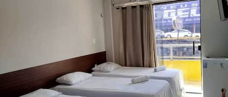 Standard Quadruple Room, City View | Desk, laptop workspace, free WiFi