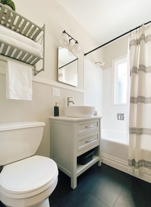 Hair dryer, towels, soap, toilet paper