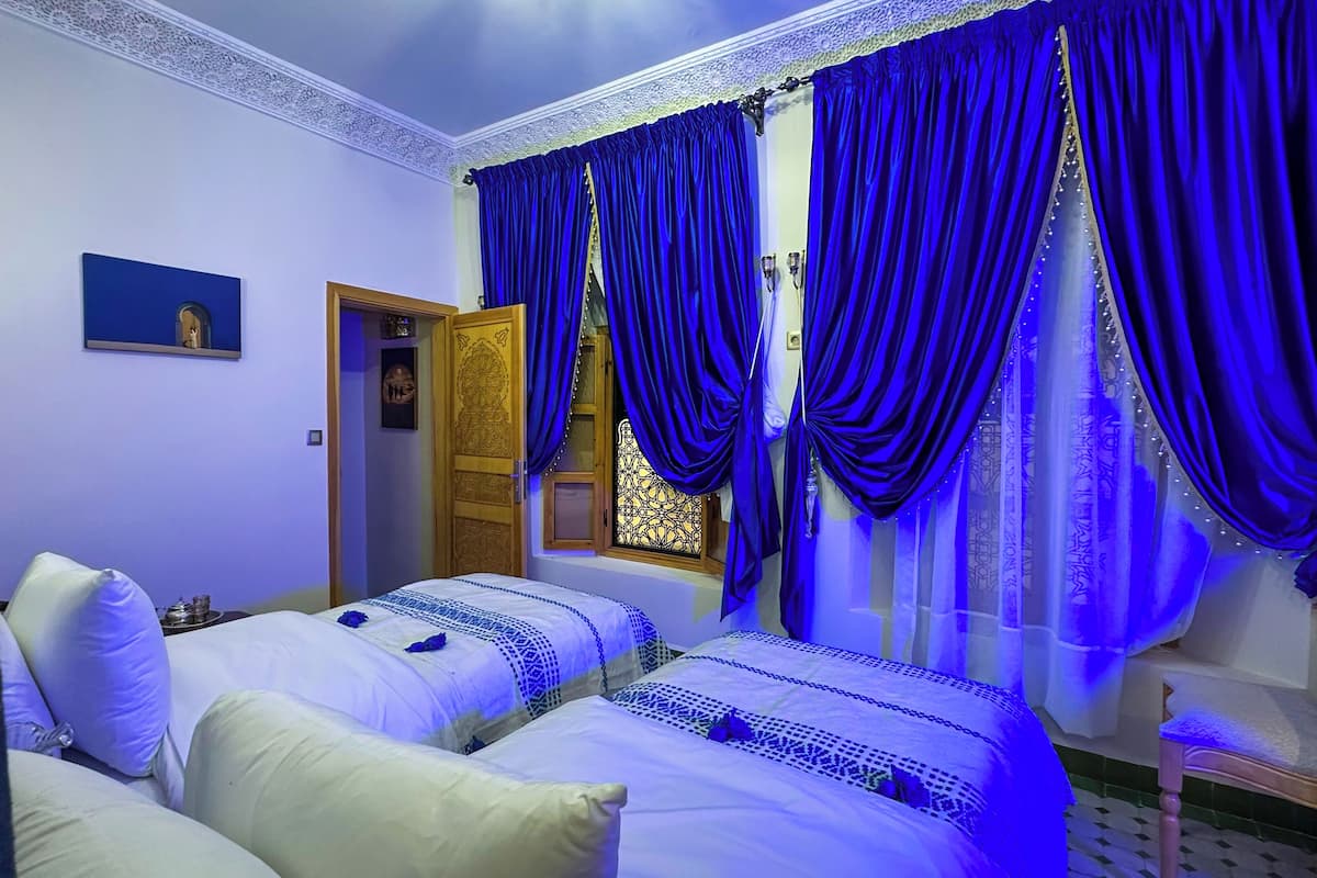 Deluxe Twin kamer | Individueel gedecoreerd, individueel gemeubileerd, een bureau