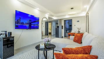 Appartamento Deluxe, balcone, vista città | Area soggiorno