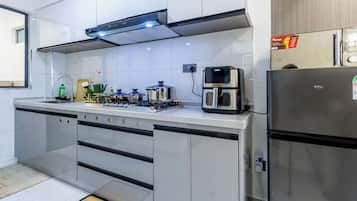 Appartamento Deluxe, balcone, vista città | Cucina privata