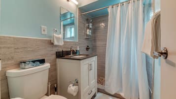 Hair dryer, towels, soap, toilet paper