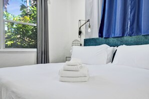2 habitaciones, tabla de planchar con plancha, wifi y ropa de cama 
