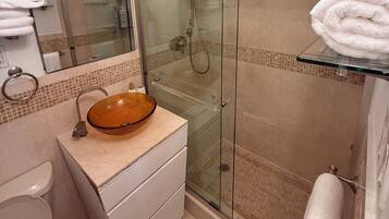 Hair dryer, towels, soap, toilet paper