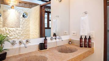 Suite, Pool View | Bathroom | Shower, free toiletries, hair dryer, towels