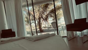 Private beach, white sand, free beach cabanas, sun-loungers