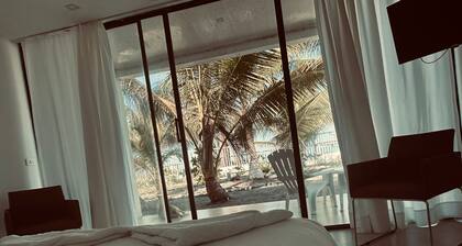 la perla suiza hotel de playa