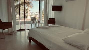 Chambre Exclusive, climatisation, vue plage | Espace de travail pour ordinateur portable, Wi-Fi gratuit