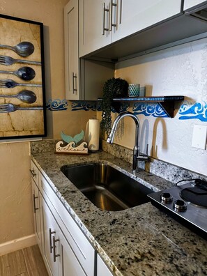 Fridge, microwave, coffee/tea maker, toaster