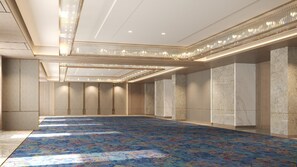 A spacious hotel room with a large carpeted area, marble walls, and a modern chandelier. - Holiday Inn Lucknow Airport (Lucknow)