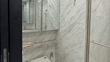 Hair dryer, bidet, towels, toilet paper