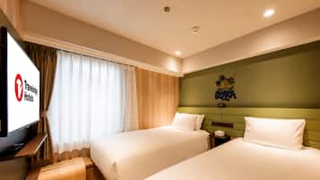 A hotel room with two beds, a television, and a wall-mounted artwork.