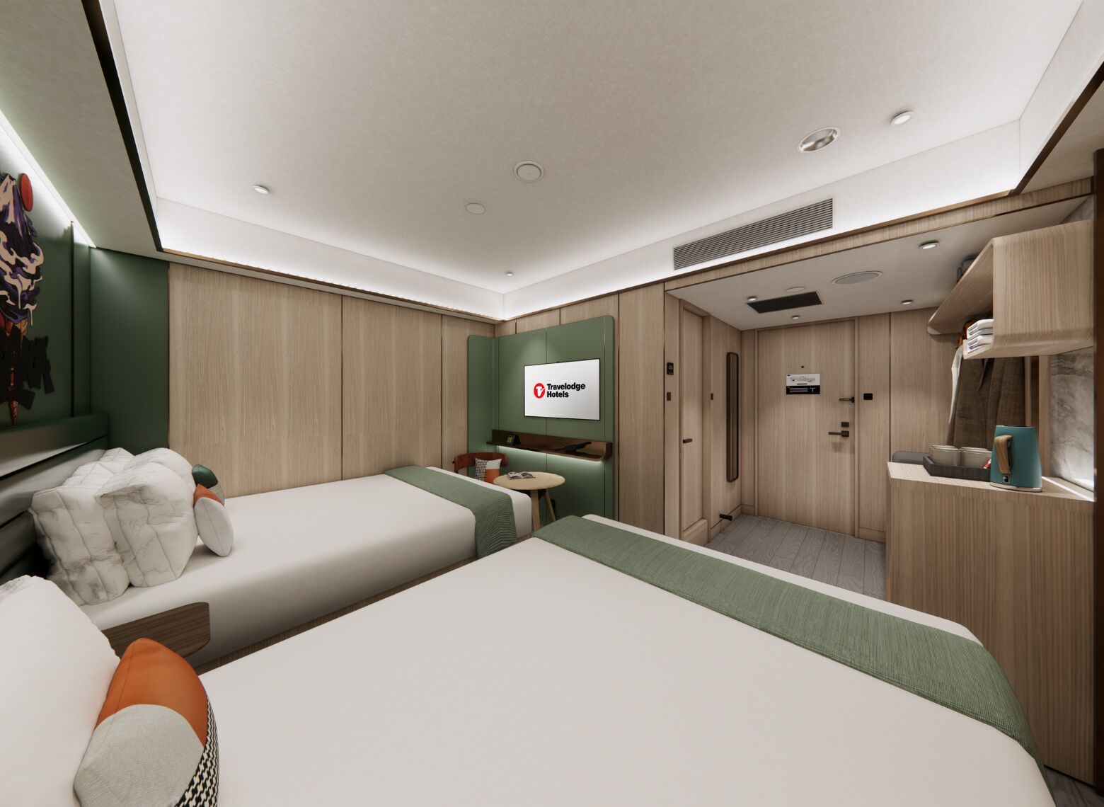 Een moderne hotelkamer met twee bedden, een zithoekje, een televisie en een kitchenette.