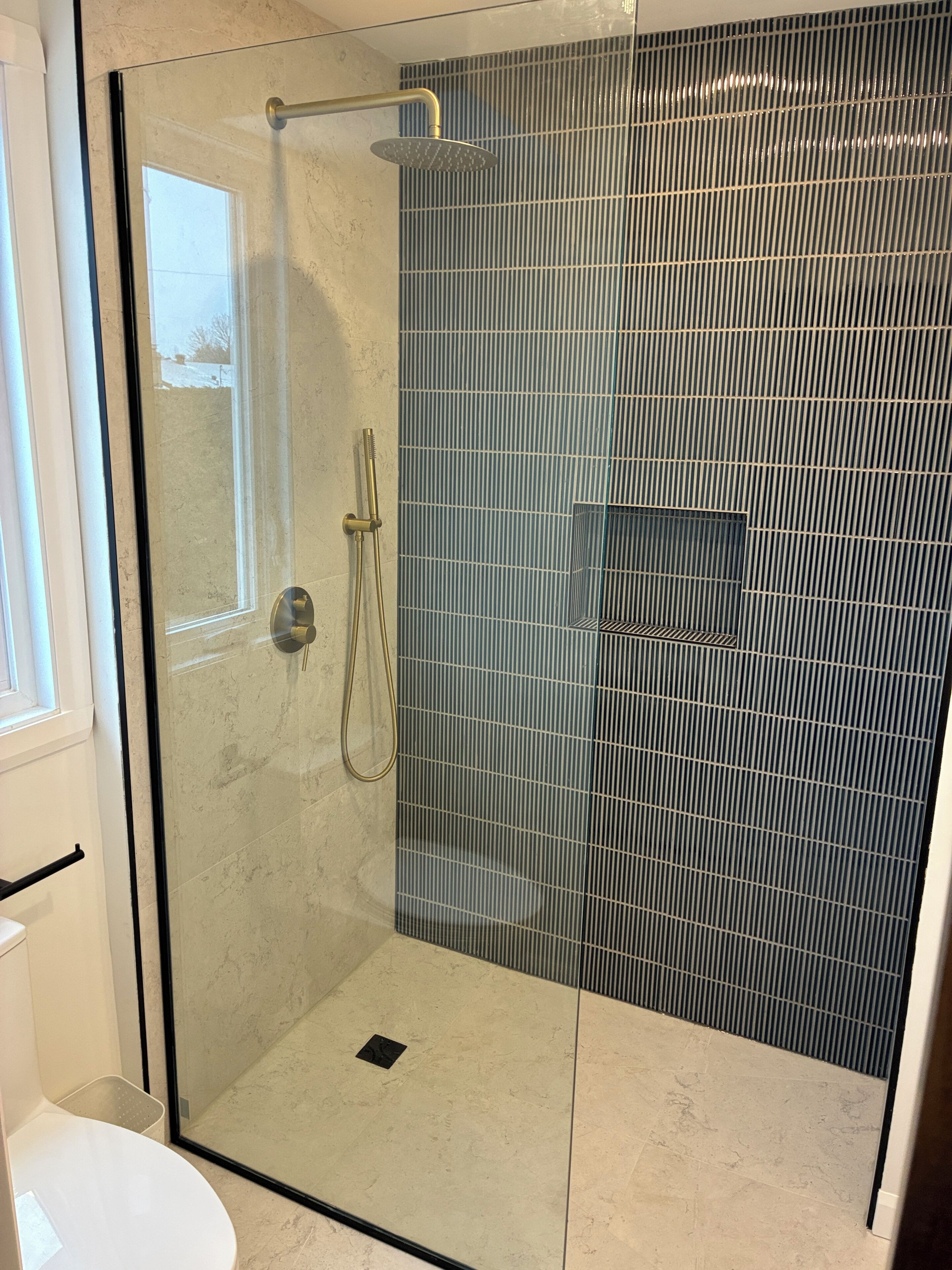 Shower, hair dryer, towels, toilet paper