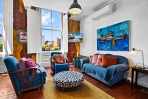 TV, fireplace - Vintage loft residence with Open-plan mezzanine's (North Melbourne)