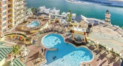 NEW LISTING 3bd, Emerald Grande Condo, Harbor and Gulf Views w/ beach services!