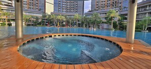 Outdoor pool - ElevaNia By SanLiving - 1BR - PIK (Jakarta)