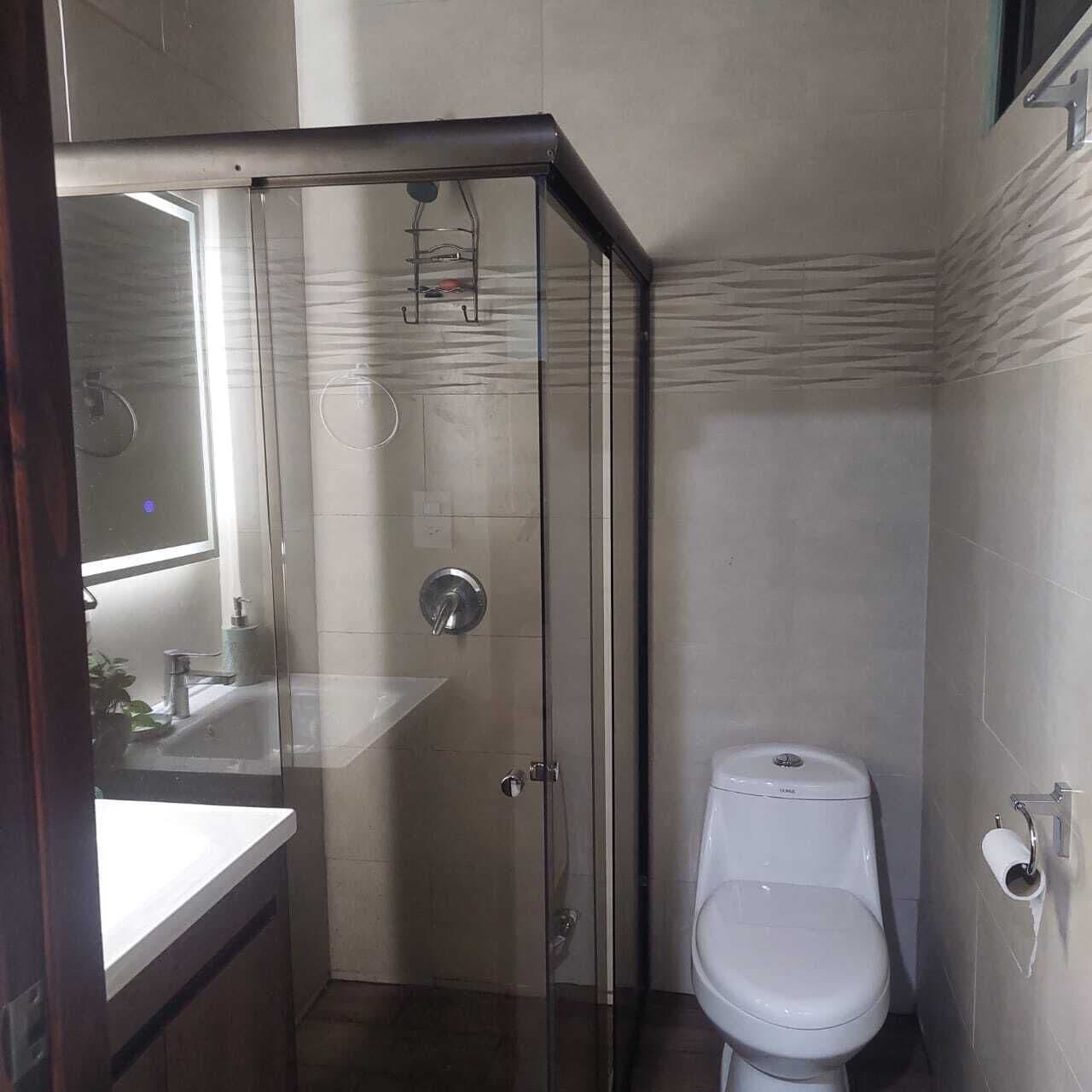 Shower, towels, soap, toilet paper