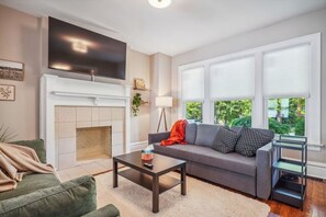 Living area - Updated Historical Home Downtown - Sunroom & Yard! Perfect for Families & Groups (Columbus)