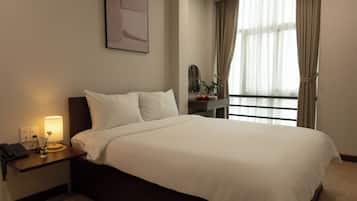 Deluxe-dobbeltværelse - byudsigt | Premium-sengetøj, dundyner, senge med topmadrasser