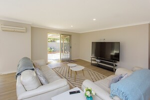 Casa superior, varias camas, no fumadores, vistas al jardín | Zona de estar