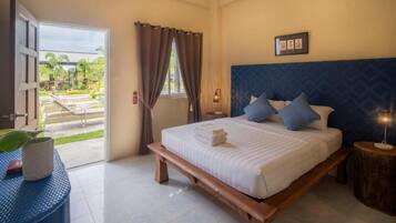 Deluxe Double Room, Pool View | Minibar, individually furnished, desk, laptop workspace