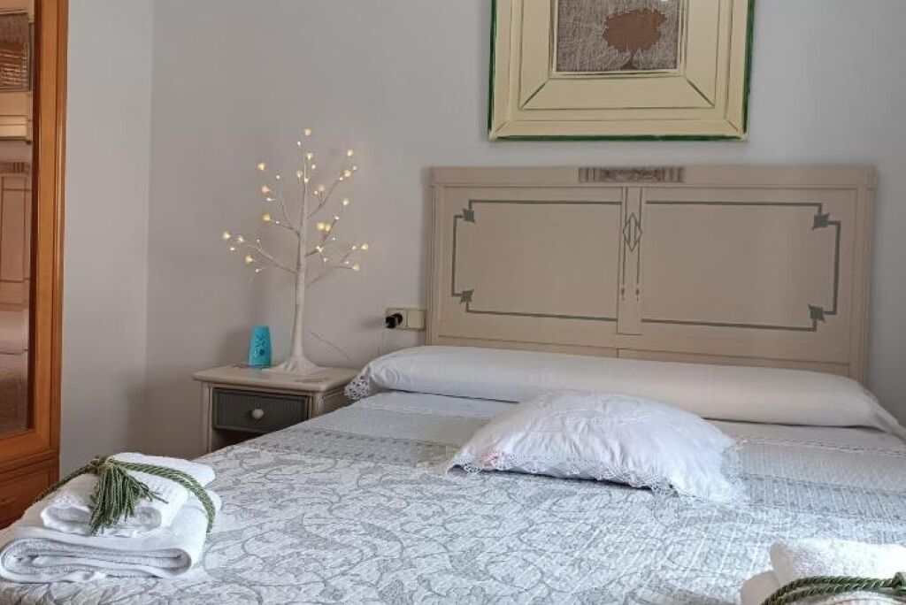 4 dormitorios, tabla de planchar con plancha, wifi gratis y ropa de cama