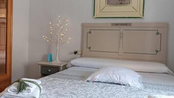 4 dormitorios, tabla de planchar con plancha, wifi gratis y ropa de cama