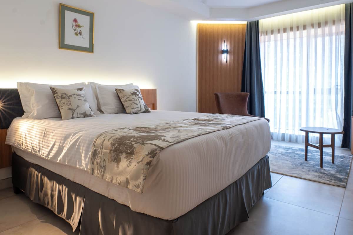 Deluxe Single Room, Balcony, City View | Egyptian cotton sheets, premium bedding, memory-foam beds, in-room safe