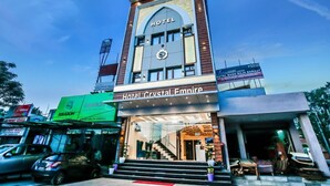 Hotel Crystal Empire with a modern facade, a visible entrance, and a staircase leading to the lobby. - hotel crystal empire  (Dera Bassi)