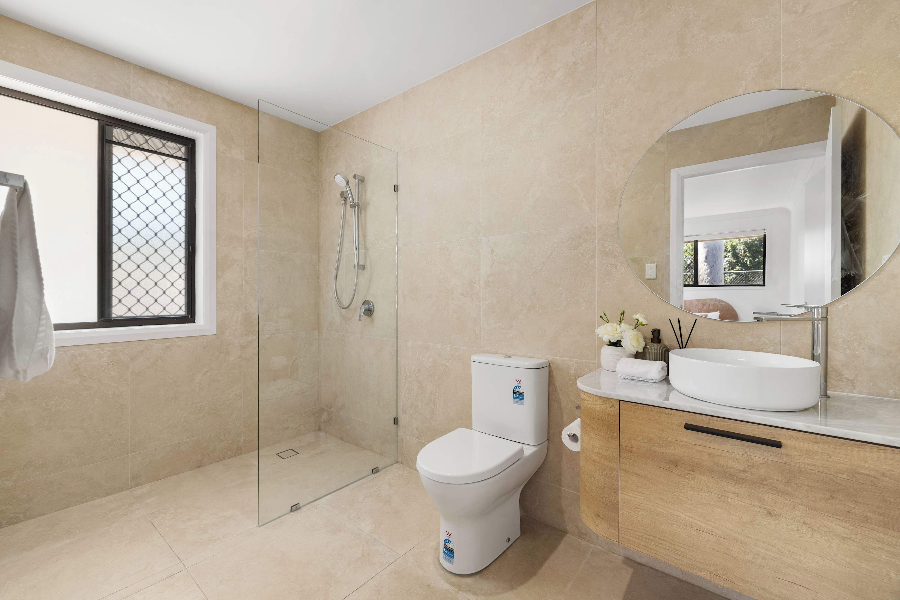 Shower, hair dryer, towels, shampoo