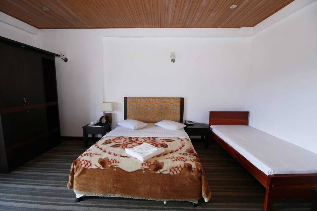 Deluxe-Dreibettzimmer