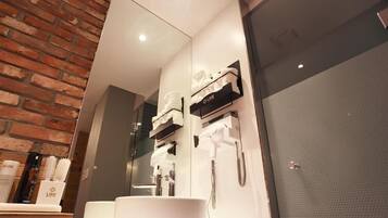 Combined shower/tub, hair dryer, towels, soap