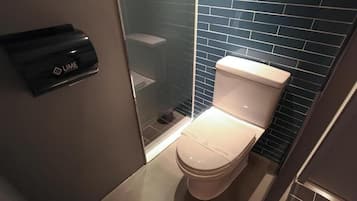 Combined shower/tub, hair dryer, towels, soap